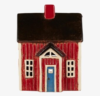 Foto av detaljrik ljuslykta med skandinavisk charm