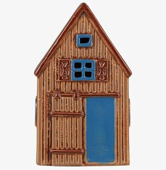 Bild av rustik ljuslykta med nordisk charm och detaljer