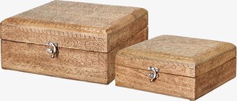 Bild av två dekorativa träaskar i skandinavisk stil