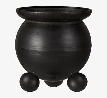 Foto av elegant svart kruka i järn med unik design