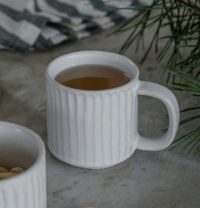 Foto: Harmonisk komposition med glöggmugg och naturtoner