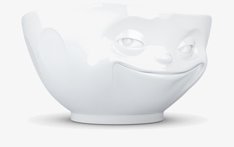 Bild av porslinsskål med charmigt leende och humor