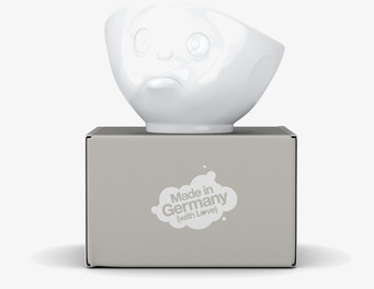 Bild av unik porslinsskål med melankoliskt ansikte