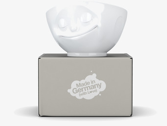 Bild av en glad porslinsskål med elegant förpackning