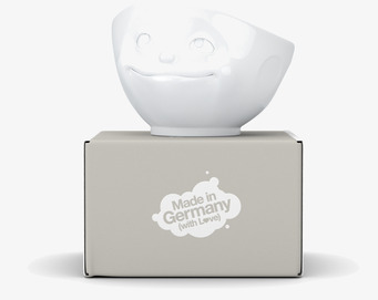 Foto av porslinsskål med drömskt ansikte och design