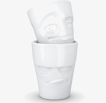 Bild av unika muggar med uttrycksfulla ansikten