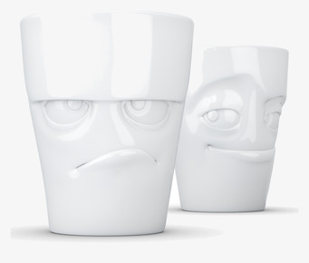 Bild av två uttrycksfulla porslinsmuggar med ansikten