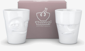 Bild av uttrycksfulla muggar med lekfulla ansikten