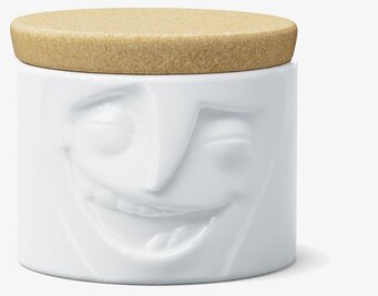 Bild av charmig porslinsburk med glad design och korklock