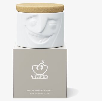 Bild av porslinsburk med lekfull design och korklock