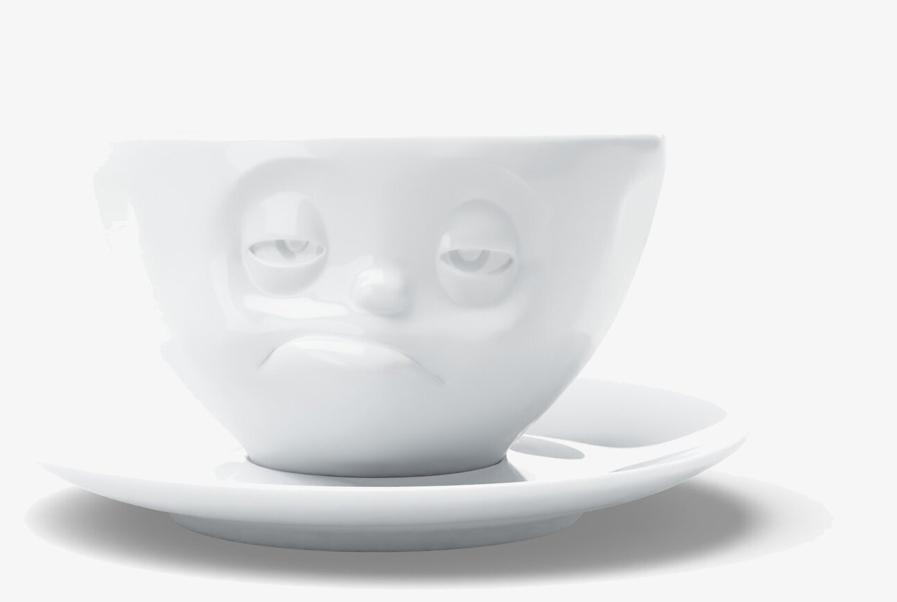 Bild av unik kaffekopp med ansiktsdesign och fat