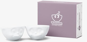 Bild av uttrycksfulla porslinsskålar med ansikten