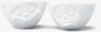 Bild på två uttrycksfulla porslinsskålar med ansikten