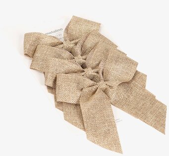 Bild av stilfull rosett i guldton för inredning