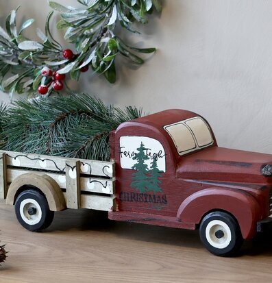 Bild av vintagebil med julgran för nostalgisk inredning