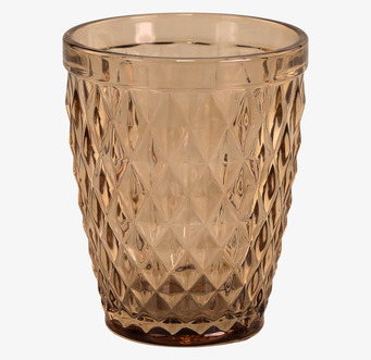 Bild av glas med honungsfärg och geometriskt mönster