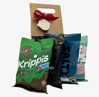 Bild av stilfull julkasse med festliga chokladprodukter