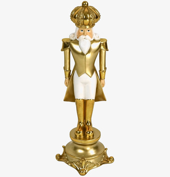 Bild av stilfull nötknäppare i vit och guld design