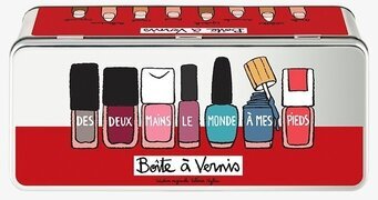 Bild av färgstark plåtburk för nagellacksförvaring