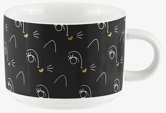 Bild av elegant kopp med konstnärligt ansiktsmönster