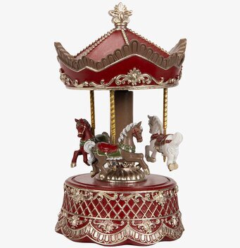 Bild av charmig röd karusellspeldosa med gulddetaljer