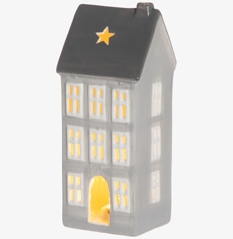 Bild av dekorativ huslykta med varm inbjudande glöd