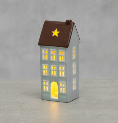 Bild av charmig ljusblå huslykta med LED-belysning