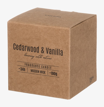 Foto av stilfullt doftljus med träveke och naturlig design