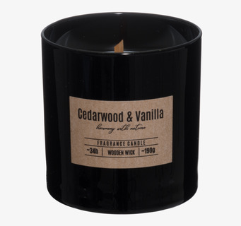 Bild av doftljus i svart glas med cederträ och vanilj