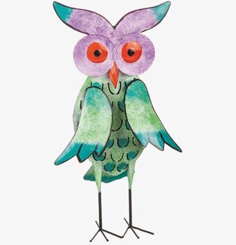Bild av dekorativ uggla i livfulla färger och detaljer