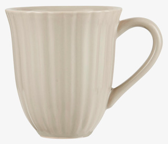 Foto av stilfull mugg med jordnära färg och textur