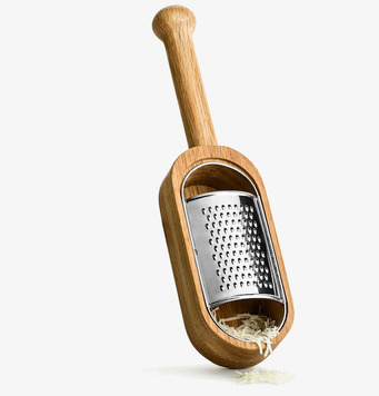 Bild av elegant rivjärn med trähandtag och metallblad