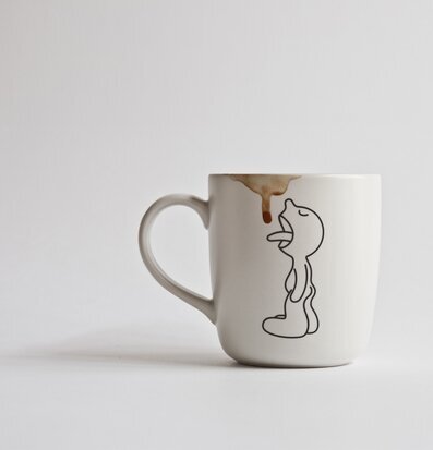 Mugg Mr.P Lick från Propaganda med lekfull design och figur