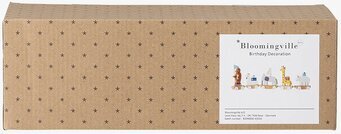 Bild av förpackning med lekfullt mönster och festlig etikett