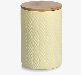 Bild av stilfull keramikburk med trälock och växtmotiv