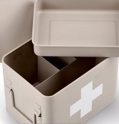 Foto av plåtburk för medicin med funktionell design