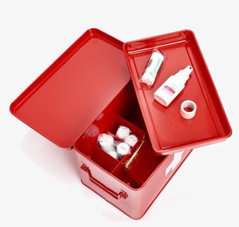 Bild av röd plåtburk för medicinska förnödenheter