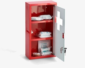 Bild av stilrent medicinskåp i röd färg med korssymbol
