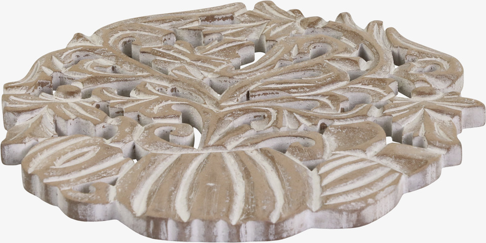 Bild av dekorativt vintageinspirerat grytunderlägg