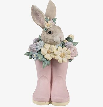 Bild av charmig kaninfigur i rosa stövlar med blommor