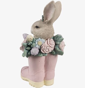 Bild av charmig kaninfigur med blommor och rosa stövlar