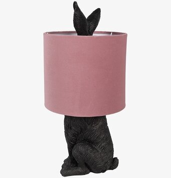 Foto av unik bordslampa med kaninformad lampfot