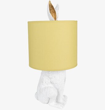 Bild av bordslampa med kanin och gul lampskärm