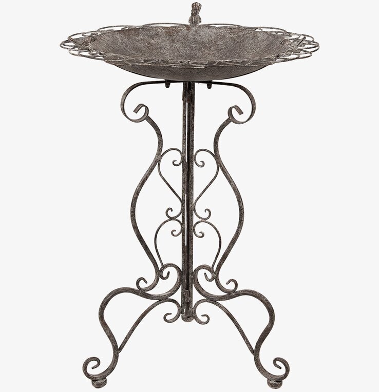 Foto av fågelbad med antikbrun finish och elegant design