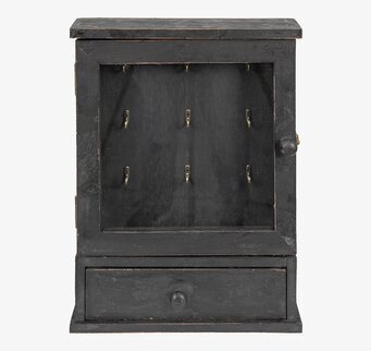 Bild av ett antiksvart nyckelskåp med rustik charm