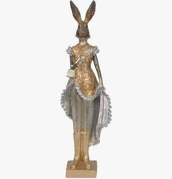 Bild av dekorativ figur med kanin i elegant klädsel