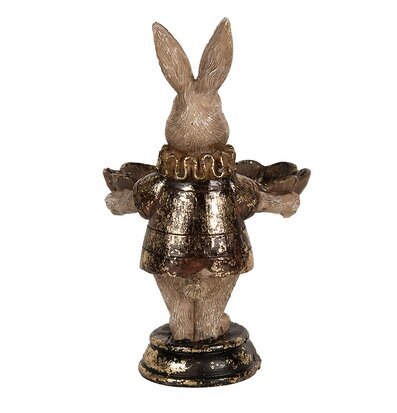 Bild av dekorativ kaninfigur med fat och detaljerad design