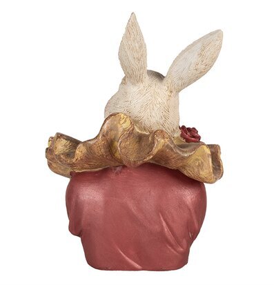 Bild av dekorativ kaninfigur i beige och rosa nyanser