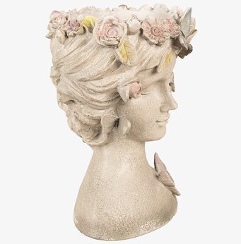 Bild av elegant kvinnohuvudkruka med blommor och fjäril