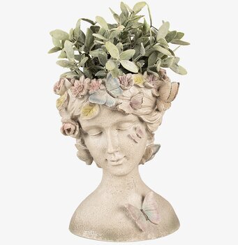 Foto av dekorativ kruka formad som skulptural byst